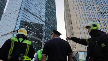 Emergency personnel work near a damaged office building in the Moscow City following a reported Ukrainian drone attack in Moscow Russia, August 1, 2023. REUTERS/Evgenia Novozhenina