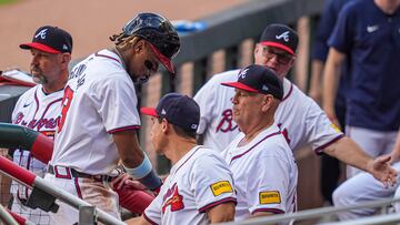 May 20, 2024; Cumberland, Georgia, USA; Atlanta Braves right fielder Ronald Acuna Jr (13) is greeted in the dugout after scoring a run against the San Diego Padres during the first inning at Truist Park. Mandatory Credit: Dale Zanine-USA TODAY Sports