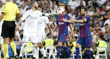 Messi y Sergio Ramos, jugadores del Barcelona y Real Madrid.