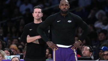 Apr 12, 2026; Los Angeles, California; Los Angeles Lakers head coach JJ Redick (left) and forward LeBron James (23) watch against the Utah Jazz in the first half at Crypto.com Arena. Mandatory Credit: Kirby Lee-Imagn Images