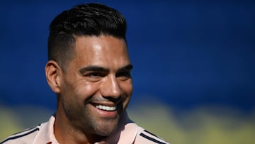 Colombian forward Radamel Falcao Garcia smiles during the warm-up session before the friendly football match between Argentina's Boca Juniors and Colombia's Millonarios in tribute to late Argentine coach Miguel Angel Russo at La Bombonera Stadium in Buenos Aires on January 14, 2026. (Photo by Luis ROBAYO / AFP)