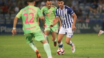 Dani Lorenzo, Manu Molina y Luis Alcalde en el Recre-Málaga.