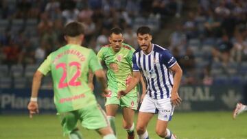 Dani Lorenzo, Manu Molina y Luis Alcalde en el Recre-Málaga.