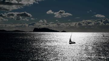 (FILES) A boat sails on the Mediterranean Sea near the Frioul islands, off the coast of Marseille, southeastern France, on December 30, 2020. After the Greeks, a sardine, the Count of Monte Cristo and more recently the flame in Marseille aboard the Belem, the harbor of Marseille will host the sailing events of the Paris Olympic Games this summer. (Photo by NICOLAS TUCAT / AFP)