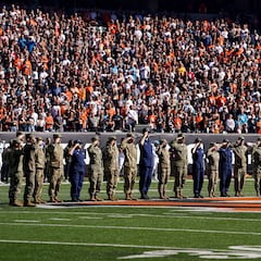 Why are troops and military members banned from participating in NFL Veterans Day events?