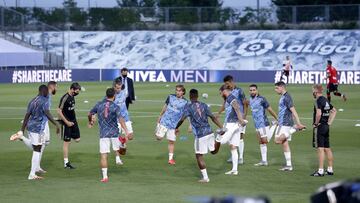 Los jugadores del Madrid, en un entrenamiento en Valdebebas.