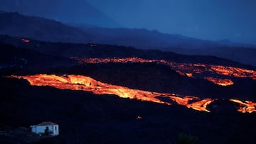 The Cumbre Vieja volcano spews lava as it continues to erupt on the Canary Island of La Palma, as seen from Tajuya, Spain, October 20, 2021. REUTERS/Susana Vera     TPX IMAGES OF THE DAY