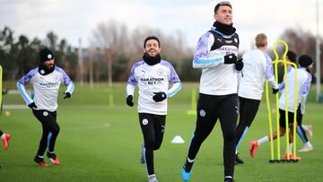Laporte y Bernardo Silva, en un entrenamiento del City