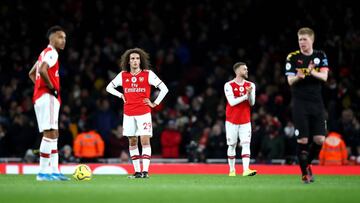 LONDON, ENGLAND - DECEMBER 15: Matteo Guendouzi of Arsenal  reacts to Manchester City scoring there third goal during the Premier League match between Arsenal FC and Manchester City at Emirates Stadium on December 15, 2019 in London, United Kingdom. (Phot