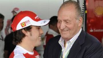 Juan Carlos I junto a Fernando Alonso.