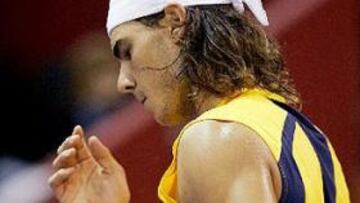 <B>PRECAVIDO.</B> Nadal trata de que su lesión no vaya a más.