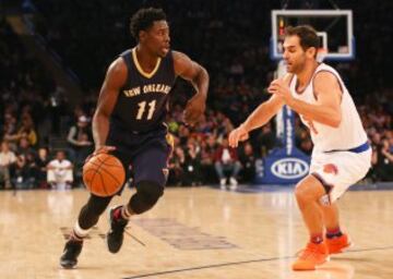 Jrue Holiday y José Calderón.