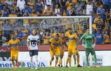 En la misma historia de cada semestre, los Pumas cayeron en ‘El Volcán’ ante Tigres. Aunque ahora el resultado no fue tan abultado como en otras ocasiones. “Solo” dos tantos endosaron los regiomontanos a los auriazules: anotados por Edu Vargas y André-Pierre Gignac, el dúo dinámico de la Liga MX que por fin parece funcionar. Con el resultado, los Tigres llegaron al 5° lugar de la tabla y los Pumas cayeron al 11°.