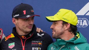 Formula One F1 - Canadian Grand Prix - Circuit Gilles Villeneuve, Montreal, Canada - June 17, 2023 Red Bull's Max Verstappen after qualifying in pole position speaks with third positioned Aston Martin's Fernando Alonso REUTERS/Mathieu Belanger