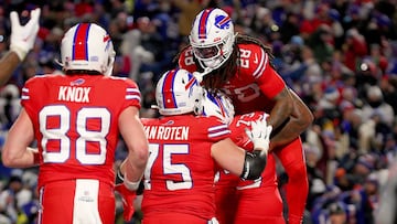 ORCHARD PARK, NEW YORK - DECEMBER 17: James Cook #28 of the Buffalo Bills celebrates with teammates after scoring a touchdown against the Miami Dolphins during the second quarter of the game at Highmark Stadium on December 17, 2022 in Orchard Park, New York.   Bryan M. Bennett/Getty Images/AFP (Photo by Bryan M. Bennett / GETTY IMAGES NORTH AMERICA / Getty Images via AFP)