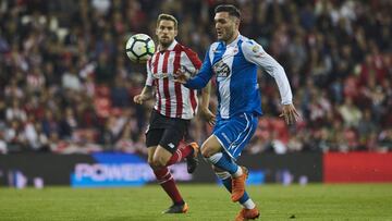 Iñigo Martínez con Lucas Pérez.
