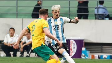 Soccer Football - Friendly - Argentina v Australia - Workers' Stadium, Beijing, China - June 15, 2023 Argentina's Alejandro Garnacho in action with Australia's Jordan Bos REUTERS/Thomas Peter