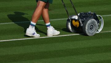 Tennis - Wimbledon - All England Lawn Tennis and Croquet Club, London, Britain - July 3, 2023 A groundstaff attend to the courts on the first day of Wimbledon REUTERS/Toby Melville