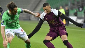 Paris Saint-Germain&#039;s French forward Kylian Mbappe (R) vies with Saint-Etienne&#039;s French defender Mathieu Debuchy during the French L1 football match between Paris-Saint Germain (PSG) and Saint-Etienne at Geoffroy Guichard stadium in Saint-Etienn