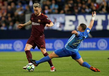 Rakitic and Mehdi Lacen.