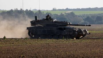An Israeli army tank manoeuvres along the fence with central Gaza, amid the ongoing conflict between Israel and the Palestinian Islamist group Hamas, January 5, 2024. REUTERS/Amir Cohen