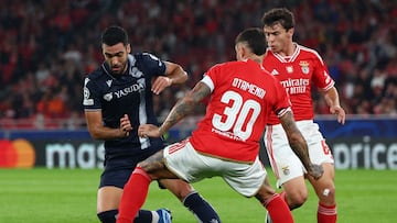 Soccer Football - Champions League - Group D - Benfica v Real Sociedad - Estadio da Luz, Lisbon, Portugal - October 24, 2023 Real Sociedad's Mikel Merino in action with Benfica's Nicolas Otamendi REUTERS/Pedro Nunes