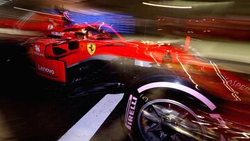 SINGAPORE - SEPTEMBER 15: Sebastian Vettel of Germany driving the (5) Scuderia Ferrari SF71H in the Pitlane during qualifying for the Formula One Grand Prix of Singapore at Marina Bay Street Circuit on September 15, 2018 in Singapore.  (Photo by Mark Thompson/Getty Images)