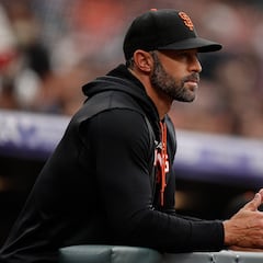 Why is Giants manager Gabe Kapler refusing to stand for the national anthem?