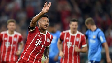 Bayern Munich&#039;s French midfielder Corentin Tolisso celebrates scoring during the German First division Bundesliga football match FC Bayern Munich vs Bayer 04 Leverkusen in Munich, southern Germany, on August 18, 2017. / AFP PHOTO / dpa / Andreas Gebert / NO Getty Images (GETTY-VD) - Germany OUT / RESTRICTIONS: DURING MATCH TIME: DFL RULES TO LIMIT THE ONLINE USAGE TO 15 PICTURES PER MATCH AND FORBID IMAGE SEQUENCES TO SIMULATE VIDEO. == RESTRICTED TO EDITORIAL USE == FOR FURTHER QUERIES PLEASE CONTACT DFL DIRECTLY AT + 49 69 650050
  / 