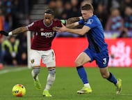 West Ham United's Dutch striker #07 Crysencio Summerville (L) vies with Bournemouth's French defender #03 Adrien Truffert (R) during the English Premier League football match between West Ham United and Bournemouth at the London Stadium, in east London on February 21, 2026. (Photo by Rhianna Chadwick / AFP) / RESTRICTED TO EDITORIAL USE. No use with unauthorized audio, video, data, fixture lists, club/league logos or 'live' services. Online in-match use limited to 120 images. An additional 40 images may be used in extra time. No video emulation. Social media in-match use limited to 120 images. An additional 40 images may be used in extra time. No use in betting publications, games or single club/league/player publications. /