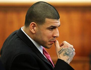 Former New England Patriots football player Aaron Hernandez sits during his murder trial at Bristol County Superior Court in Fall River, Massachusetts, April 2, 2015.