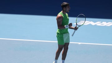 Spain's Carlos Alcaraz reacts after a point against Germany's Yannick Hanfmann during their men's singles match on day four of the Australian Open tennis tournament in Melbourne on January 21, 2026. (Photo by IZHAR KHAN / AFP) / -- IMAGE RESTRICTED TO EDITORIAL USE - STRICTLY NO COMMERCIAL USE --