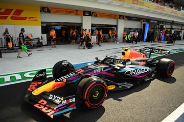 Red Bull Racing's Mexican driver Sergio Perez leaves the garage during the qualifying session for the 2023 Miami Formula One Grand Prix at the Miami International Autodrome in Miami Gardens, Florida, on May 6, 2023. (Photo by CHANDAN KHANNA / POOL / AFP)