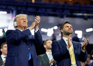 Donald Trump and Republican vice presidential nominee J.D. Vance applaud on Day 2 of the Republican National Convention.
