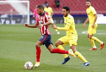 Renan Lodi y Dani Parejo. 