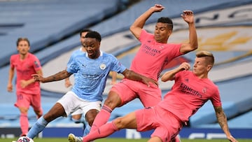 Raheem Sterling, Casemiro and Toni Kroos vie for the ball during the Champions League last 16 match between Manchester City and Real Madrid in the 2019-20 season.