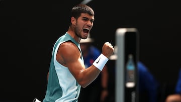 Spain's Carlos Alcaraz reacts on a point against Britain's Jack Draper during their men's singles match on day eight of the Australian Open tennis tournament in Melbourne on January 19, 2025. (Photo by DAVID GRAY / AFP) / -- IMAGE RESTRICTED TO EDITORIAL USE - STRICTLY NO COMMERCIAL USE --