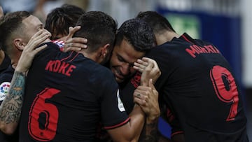 Los jugadores del Atlético celebran el gol de Vitolo.