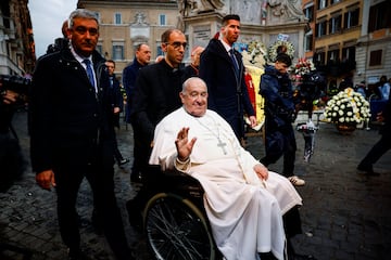 Still rolling | Pope Francis, with a large bruise on his chin, leaves after the Immaculate Conception celebration prayer near the Spanish Steps in Rome, Italy, December 8, 2024.