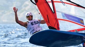 Spain's Nacho Baltasar Summers competes in race 13 of the men�s IQFoil windsurfing event during the Paris 2024 Olympic Games sailing competition at the Roucas-Blanc Marina in Marseille on August 1, 2024. (Photo by Christophe SIMON / AFP)