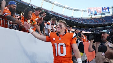 DENVER, COLORADO - OCTOBER 19: Bo Nix #10 of the Denver Broncos celebrates with fans after defeating the New York Giants 33-32 at Empower Field At Mile High on October 19, 2025 in Denver, Colorado. Matthew Stockman/Getty Images/AFP (Photo by MATTHEW STOCKMAN / GETTY IMAGES NORTH AMERICA / Getty Images via AFP)