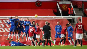 MANCHESTER, ENGLAND - FEBRUARY 06: Bruno Fernandes of Manchester United takes a free-kick which goes over the bar during the Premier League match between Manchester United and Everton at Old Trafford on February 06, 2021 in Manchester, England. Sporting s