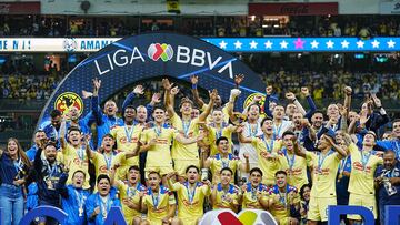 Henry Martin lifts the Clausura 2024 champion and Champion of Champions trophies  during the final second leg match between America and Cruz Azul as part of the Torneo Clausura 2024 Liga BBVA MX at Azteca Stadium on May 26, 2024 in Mexico City, Mexico.