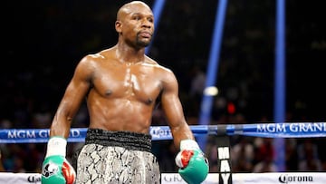 (FILES) In this file photo taken on September 13, 2014 Floyd Mayweather Jr. looks on while taking on Marcos Maidana during their WBC/WBA welterweight title fight at the MGM Grand Garden Arena in Las Vegas, Nevada. - Former world welterweight king Floyd Ma