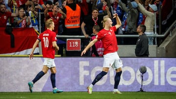 Erling Haaland celebrates scoring against Sweden.