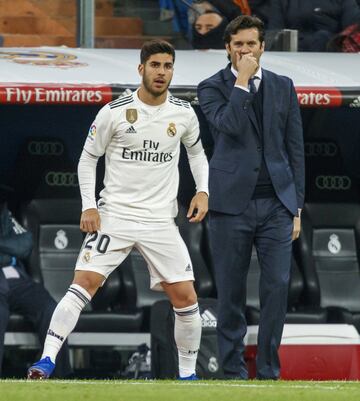 Marco Asensio y Santiago Solari.