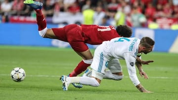 Salah (left) is injured in a Champions League final tussle with Ramos.