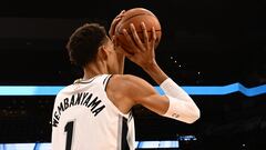 French basketball player Victor Wembanyama demonstrates his skills following a news conference introducing the Spurs 2023 Draft Class, at the AT&T Center in San Antonio, Texas, on June 24, 2023. (Photo by Patrick T. Fallon / AFP)