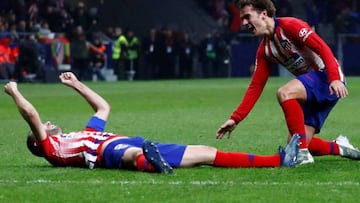 Godín (left) celebrates with Antoine Griezmann after his late winner against Athletic Bilbao is finally given after a VAR review.