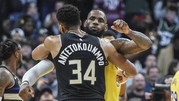 Dec 19, 2019; Milwaukee, WI, USA;  Milwaukee Bucks forward Giannis Antetokounmpo (34) gives Los Angeles Lakers forward LeBron James (23) a hug after a game at Fiserv Forum. Mandatory Credit: Benny Sieu-USA TODAY Sports